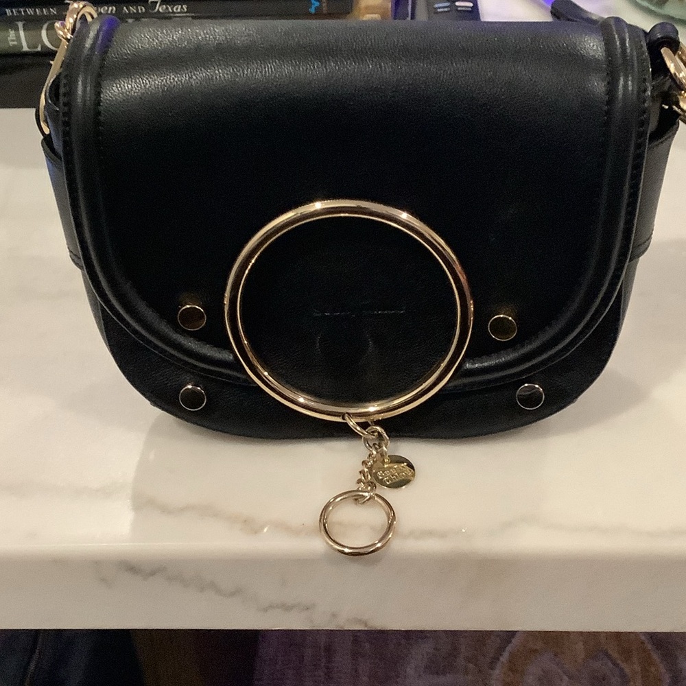 94. SeeBy Chloe Chic Black Leather Crossbody Bag with Gold Ring Detail, Brand